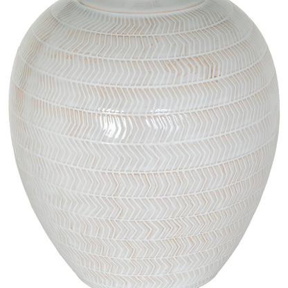 White ceramic vase with decorative pattern on a white background