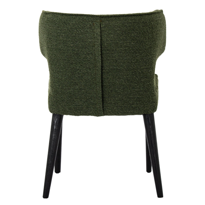Green upholstered chair with black legs on a white background