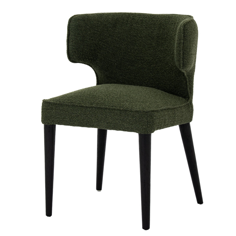 Green upholstered chair with black legs on a white background