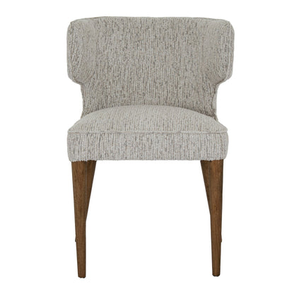 Gray upholstered chair with wooden legs on a white background