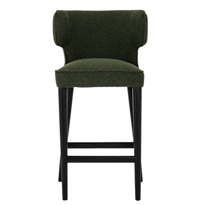 Green bar stool with black legs on a white background