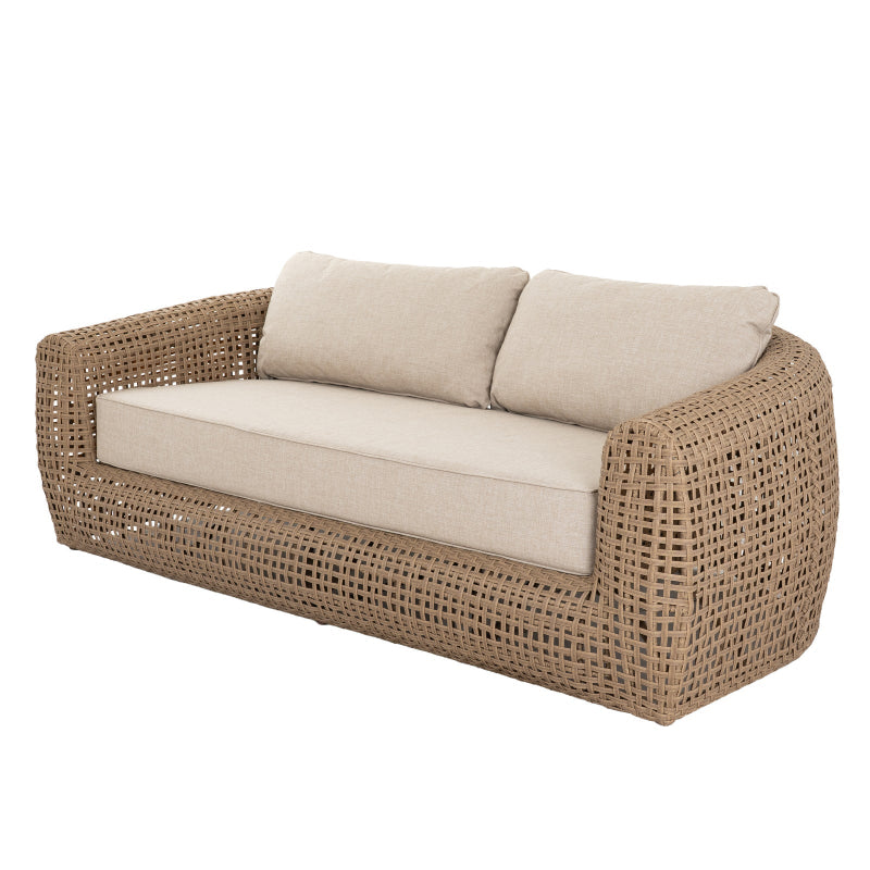 Wicker outdoor sofa with beige cushions on a white background