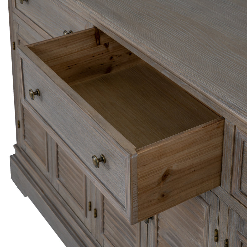 Wooden dresser with an open drawer on a white background