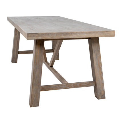 Wooden dining table with a rustic design on a white background
