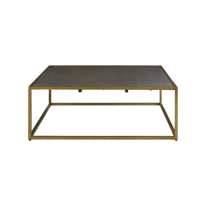 Square coffee table with a dark surface and gold metal frame on a white background