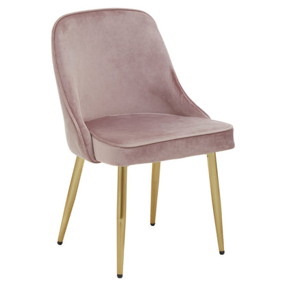 Pink velvet chair with gold legs on a white background