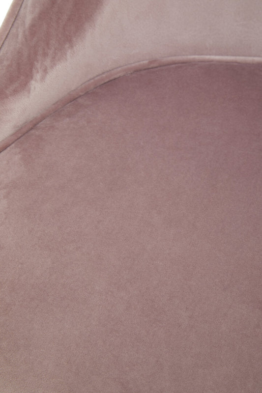 Close-up of a soft, textured mauve fabric surface