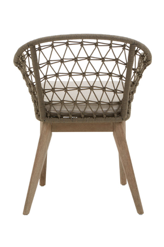 Woven chair with wooden legs on a white background