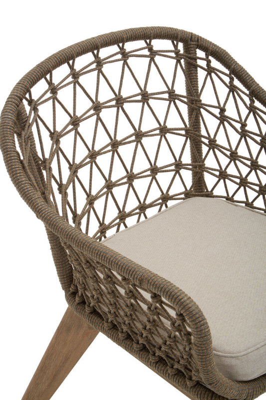Woven chair with a cushion on a white background