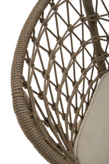 Close-up of a woven chair with a neutral background