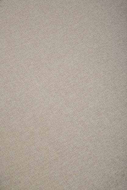 Textured beige fabric pattern