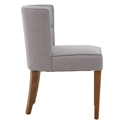Gray upholstered chair with wooden legs on a white background