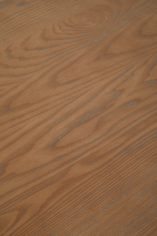 Close-up of a wooden surface with visible grain and texture