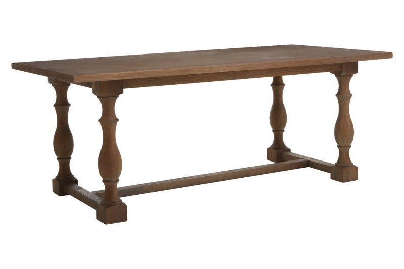 Wooden table with turned legs on a white background