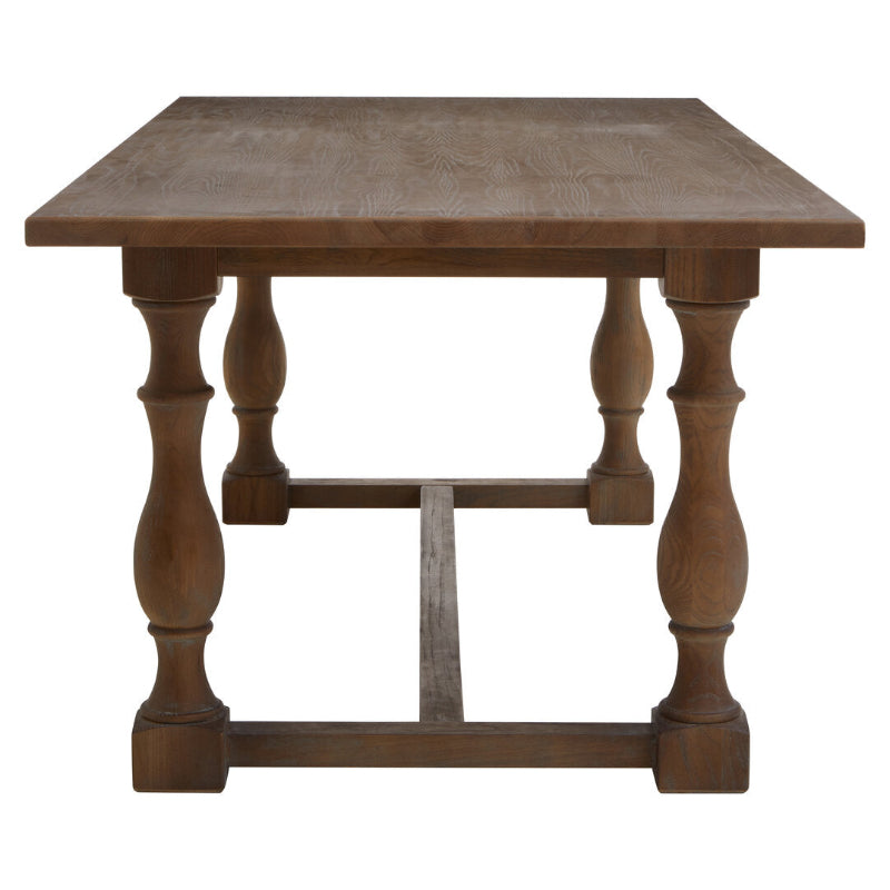 Wooden table with turned legs on a white background