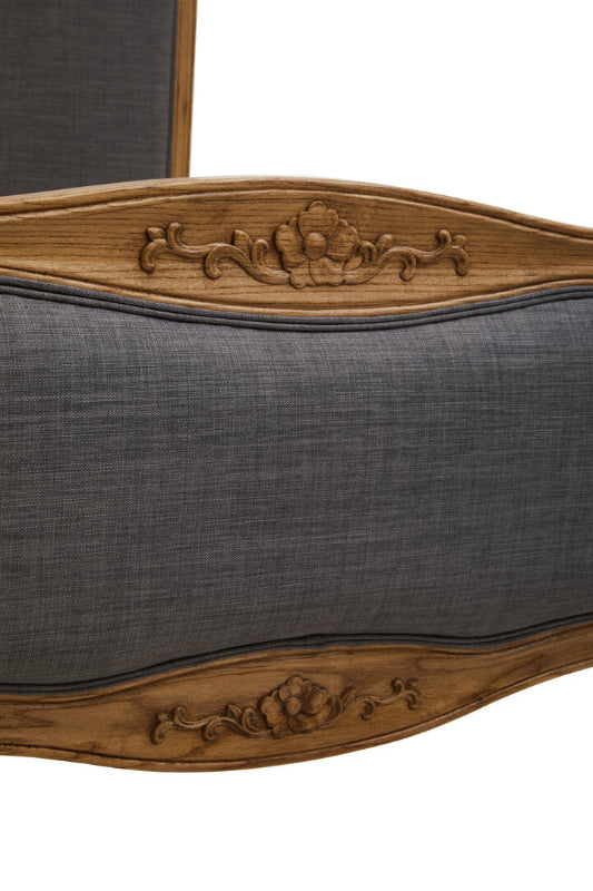 Wooden headboard with gray upholstered panel on a white background