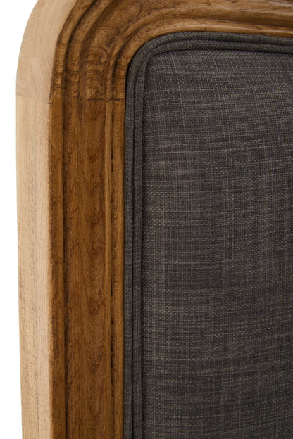 Close-up of a wooden frame with a grey upholstered panel