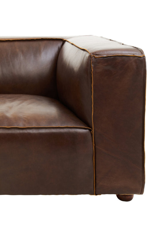Brown leather sofa corner on a white background