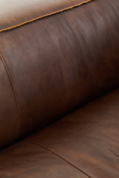 Close-up of a brown leather sofa