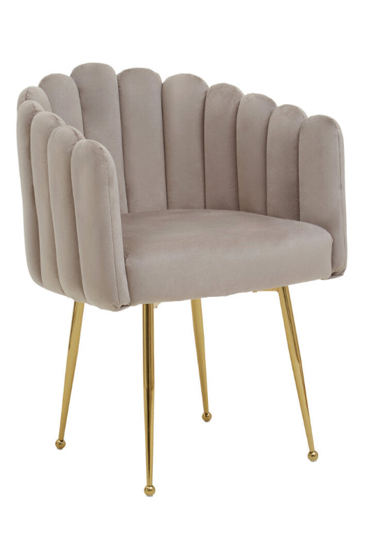 Beige velvet chair with gold legs on a white background