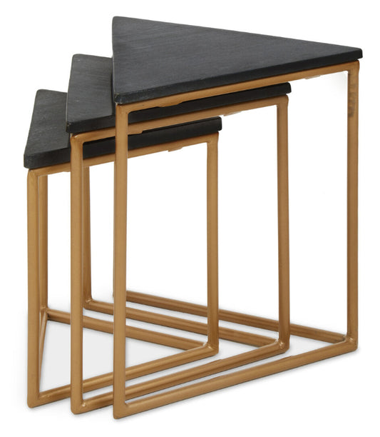 Set of three nesting tables with black tops and gold frames on a white background