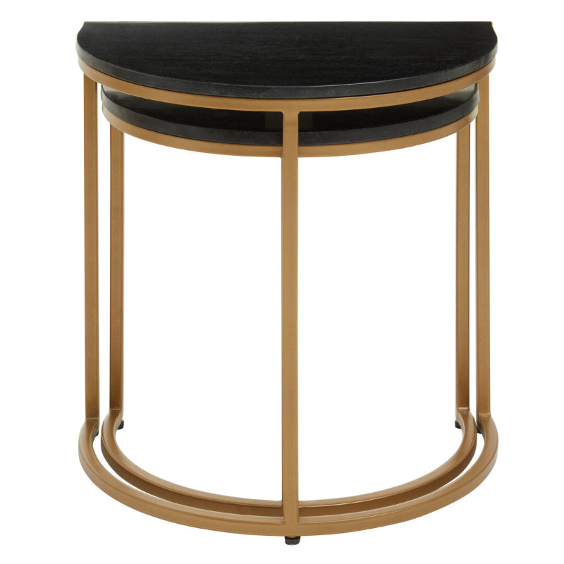 Set of two half-moon side tables with black tops and gold frames on a white background