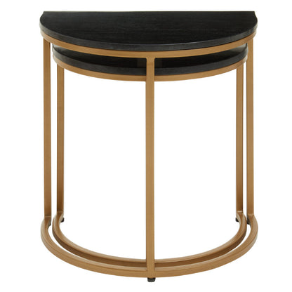 Set of two half-moon side tables with black tops and gold frames on a white background