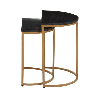 Pair of nest of tables gold metal frames  and black marble tops on a white background