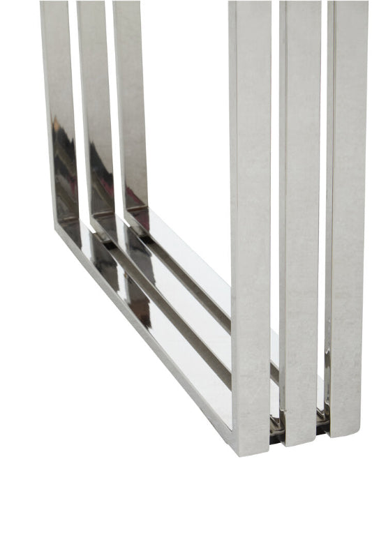 Metallic rectangular object with vertical bars on a white background