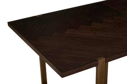 Dark wooden table top and brass legs on a white background