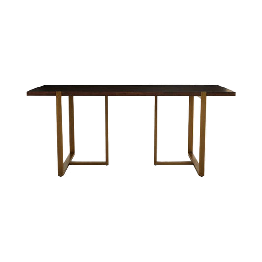 Dark wooden table with gold metal legs on a white background