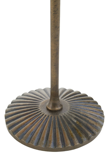 Decorative metal base with ribbed design on a white background
