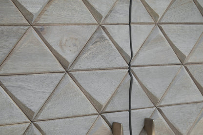 Close-up of sideboard doors with geometric pattern