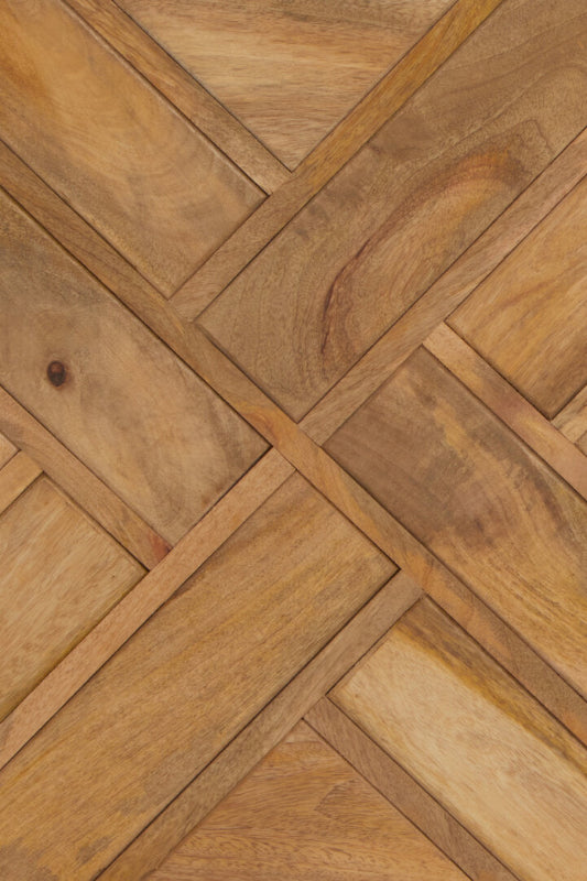Close-up of wooden sideboard with a herringbone pattern