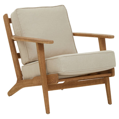 Wooden armchair with beige cushions on a white background