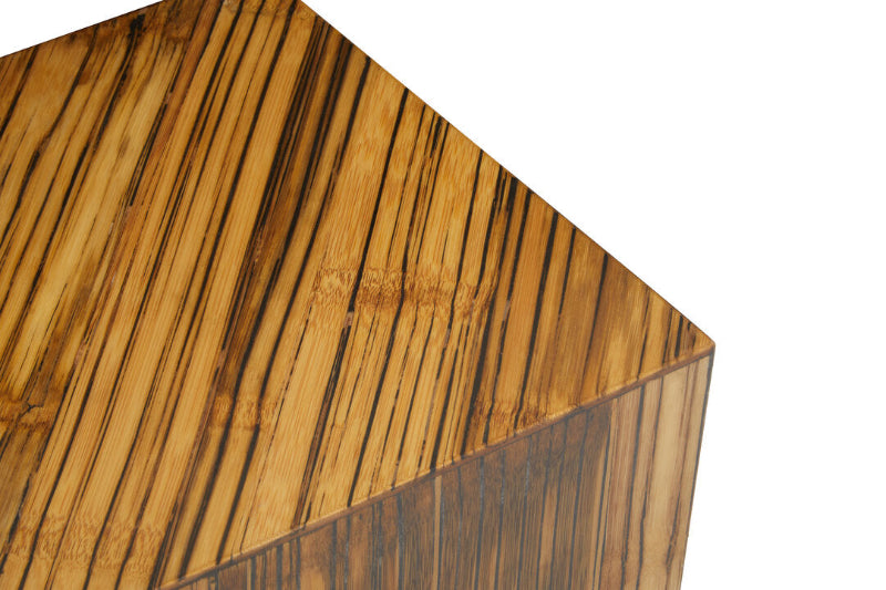 Close-up of a wooden surface with a zebra stripe pattern on a white background