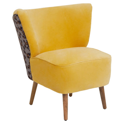 Yellow armchair with patterned backrest on a white background