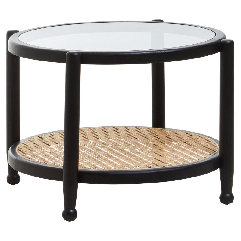 Round coffee table with glass top and wicker shelf on a white background