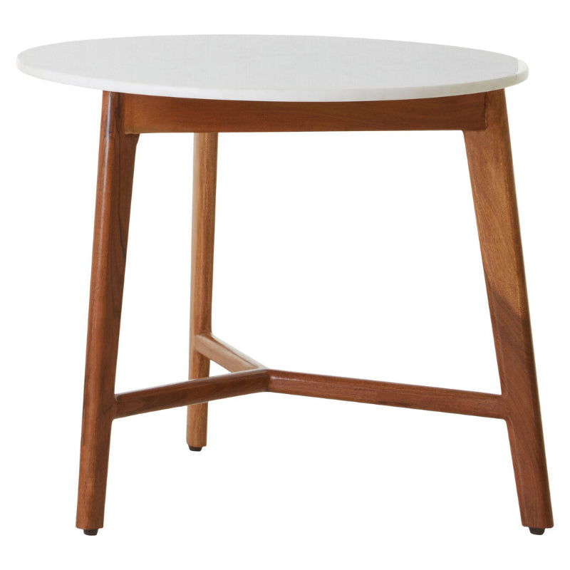 Round table with white top and wooden legs on a white background