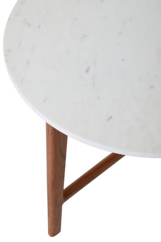 Round marble table with wooden legs on a white background