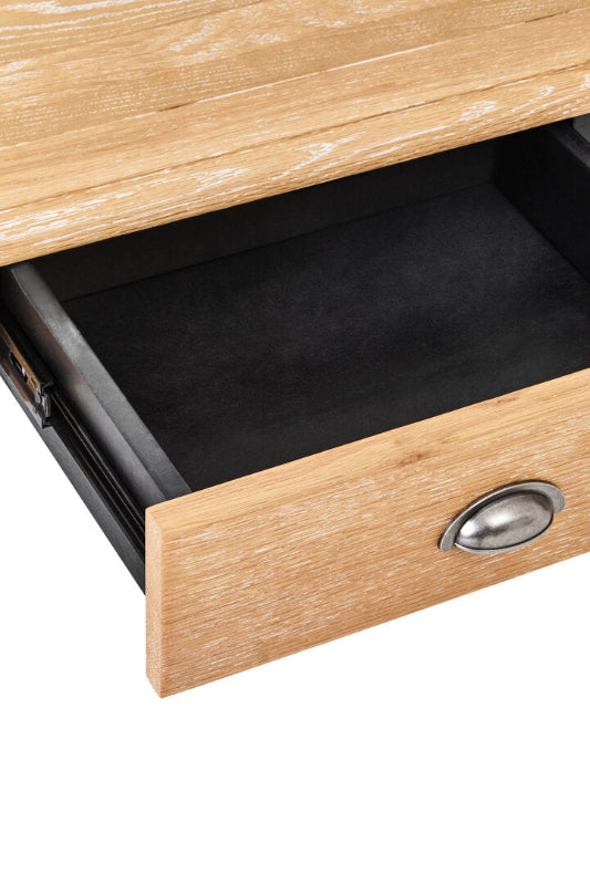 Wooden drawer with a metallic handle on a white background