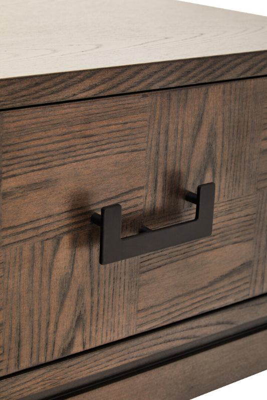 Wooden drawer with a metal handle on a white background