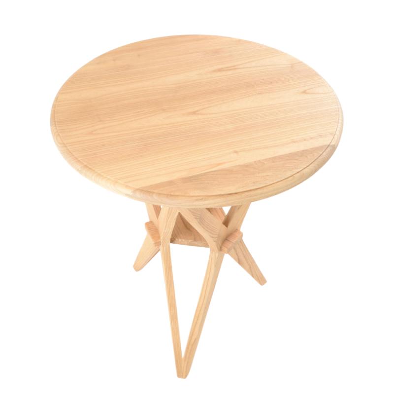 A round light natural wood side table with a star-shaped folding tripod base, shown on a solid white background.