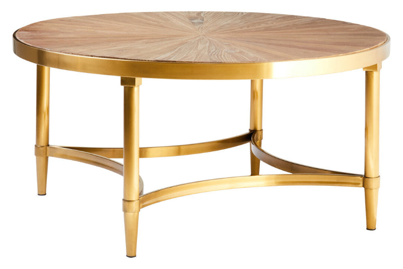 Round gold coffee table with a wooden top on a white background