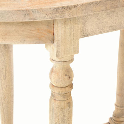 Close-up detail of a light natural wood table leg with a turned ball-and-spindle design, showing the wood grain and finish against a white background.
