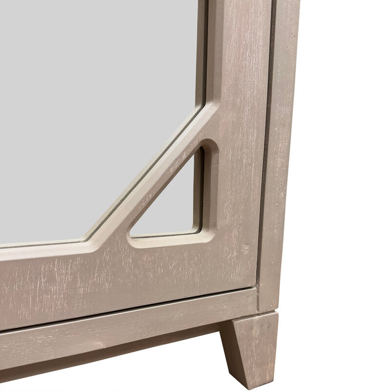 Close-up of a wooden side table with geometric design on a white background
