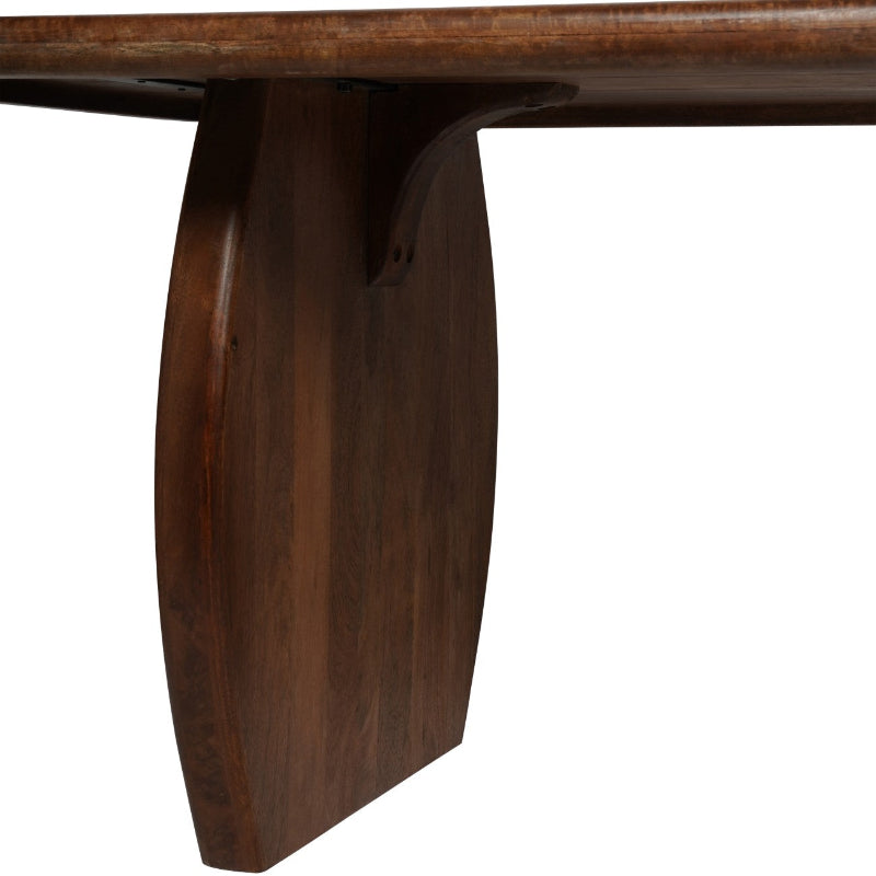 Close-up of a wooden table leg on a white background