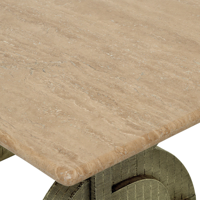 Close-up of a stone-topped table with wicker base
