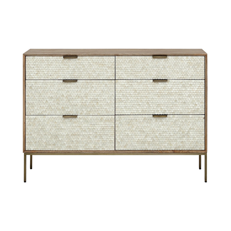 Dresser with textured front panels and gold accents on a white background