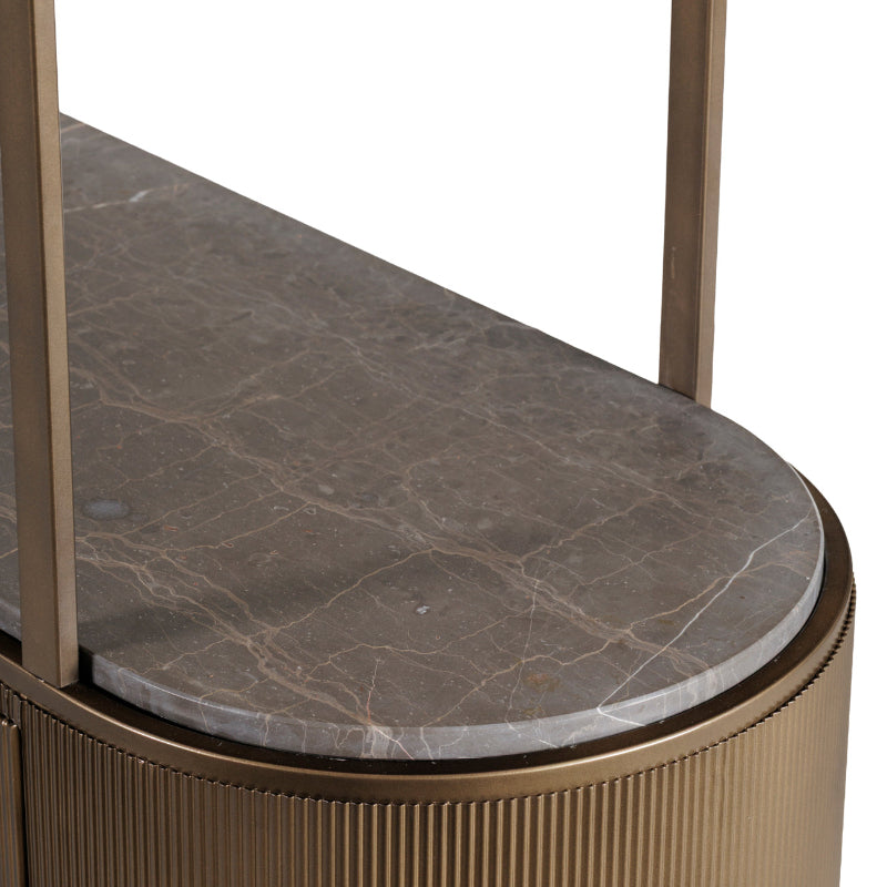 Round marble table with bronze base on a white background